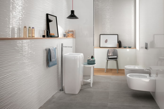 embossed white tiles in the bathroom interior