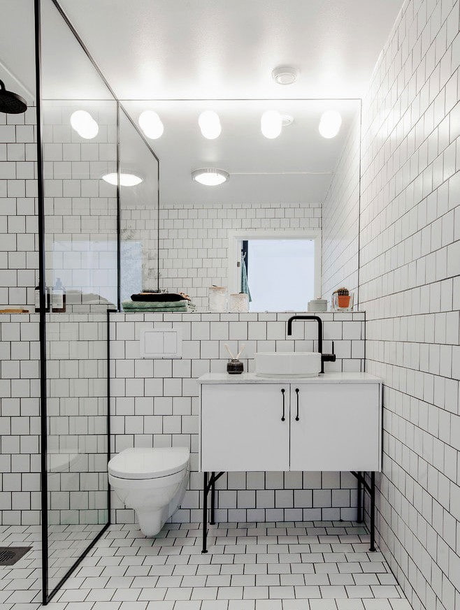 white tiles with grout in the bathroom interior