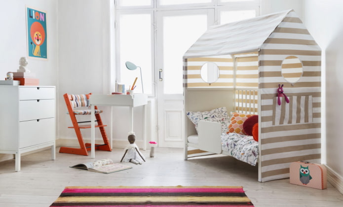 bed in the form of a house in the nursery bed in the form of a house in the nursery