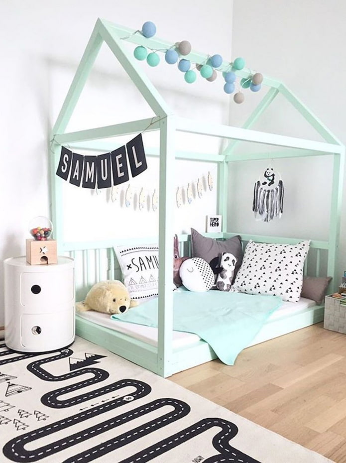 bed in the form of a house in the nursery bed in the form of a house in the nursery