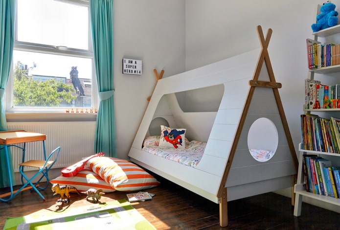 bed in the form of a wigwam in the nursery for a boy bed in the form of a wigwam in the nursery for a boy