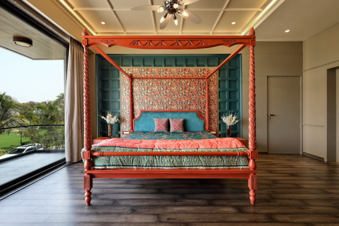 red bed in the interior of the bedroom