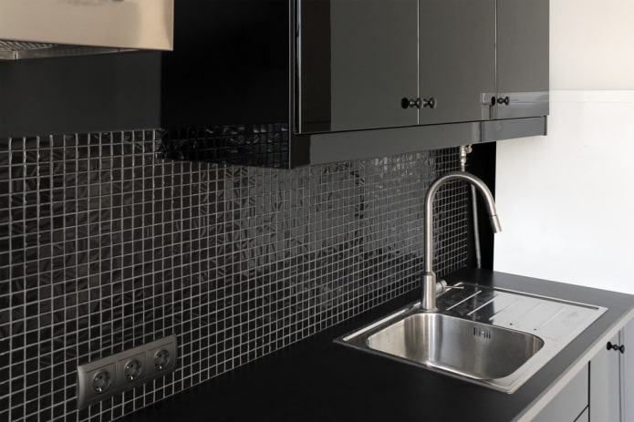 black mosaic tiles in the kitchen