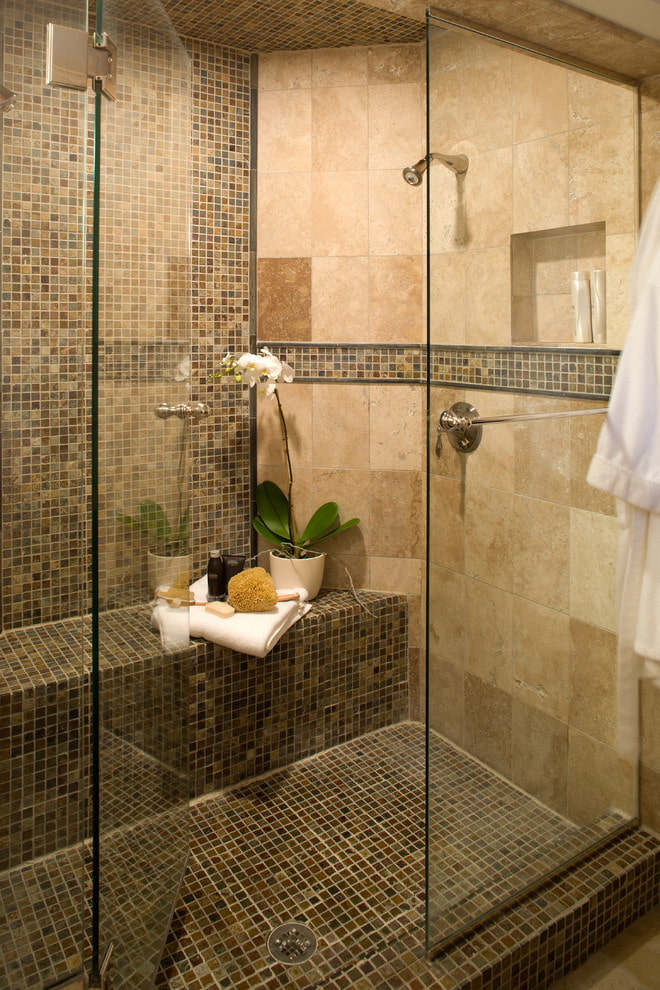 shower room with a seat made of tiles in the interior shower room with a seat made of tiles in the interior