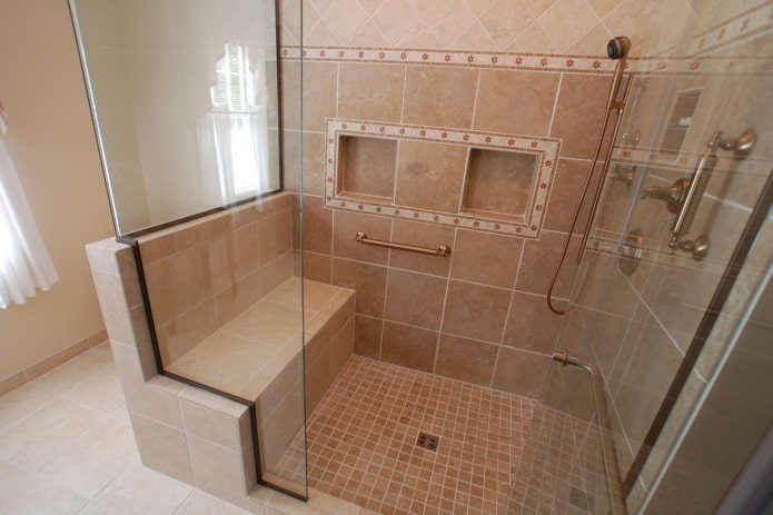 shower room with a seat made of tiles in the interior shower room with a seat made of tiles in the interior