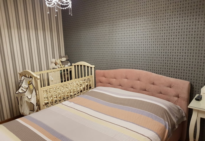 baby cot in the interior of the bedroom