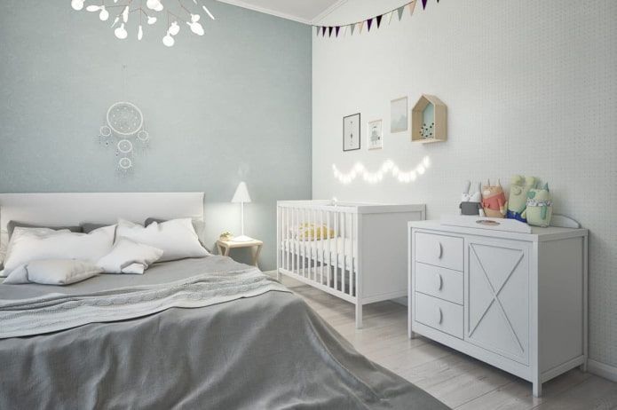 baby cot in the interior of the bedroom