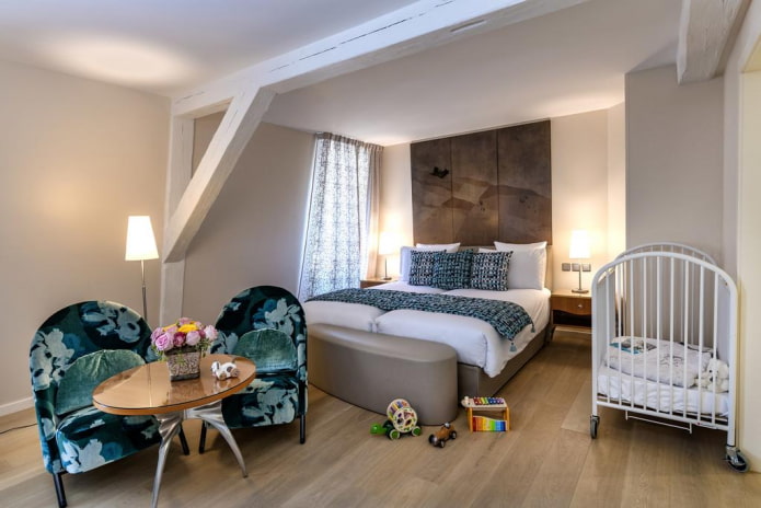 baby cot in the interior of the bedroom