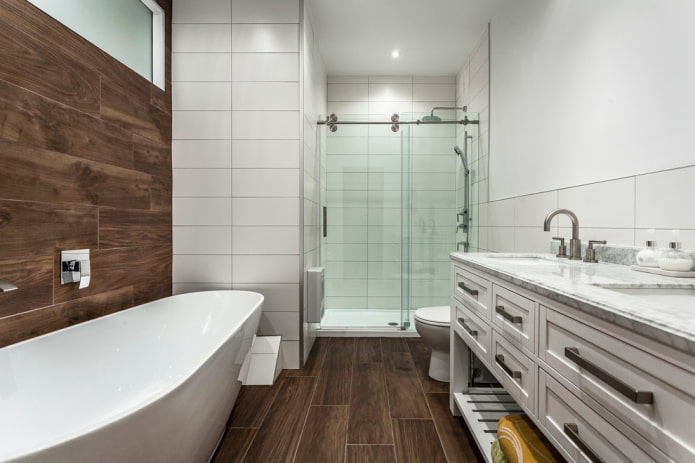 wood-like floor tiles in the bathroom interior