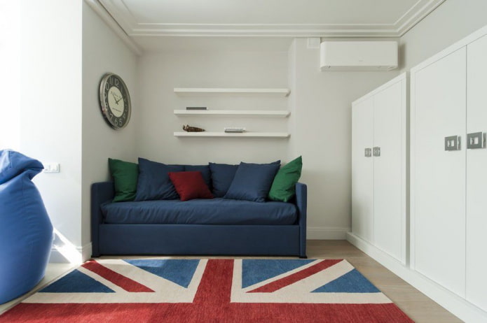 blue sofa in the interior of a teenager's room
