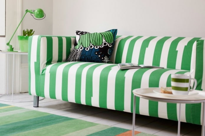sofa with green upholstery in stripes in the interior sofa with green upholstery in stripes in the interior