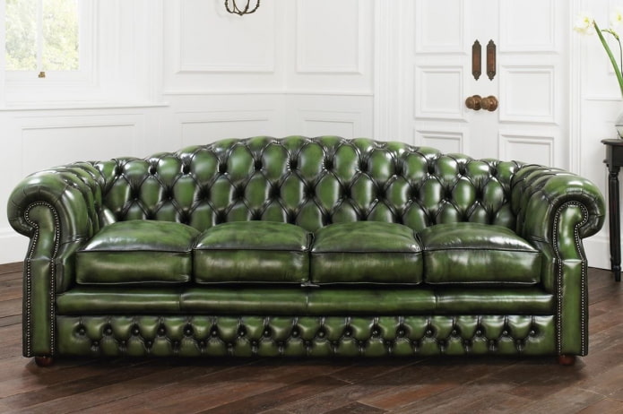 sofa with green leather upholstery in the interior sofa with green leather upholstery in the interior