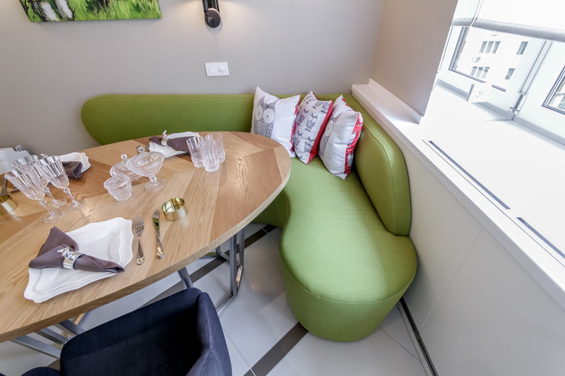 corner green sofa in the kitchen corner green sofa in the kitchen