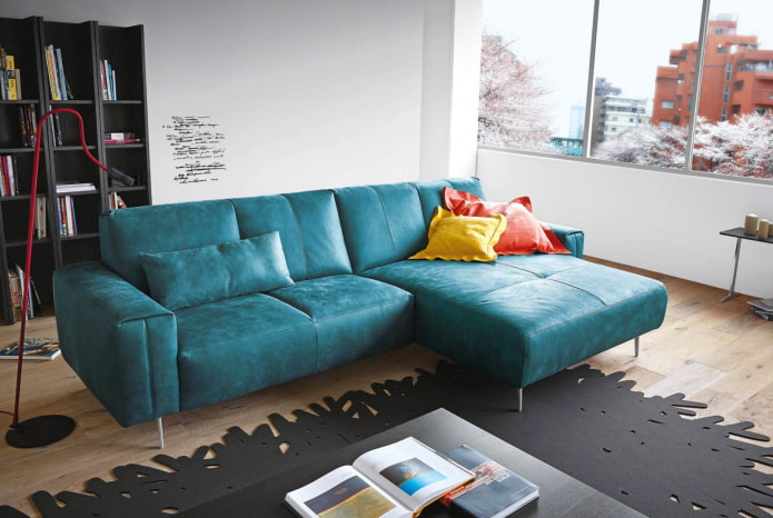 sofa with turquoise leather upholstery in the interior sofa with turquoise leather upholstery in the interior