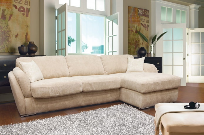 sofa model with beige ottoman in the interior sofa model with beige ottoman in the interior