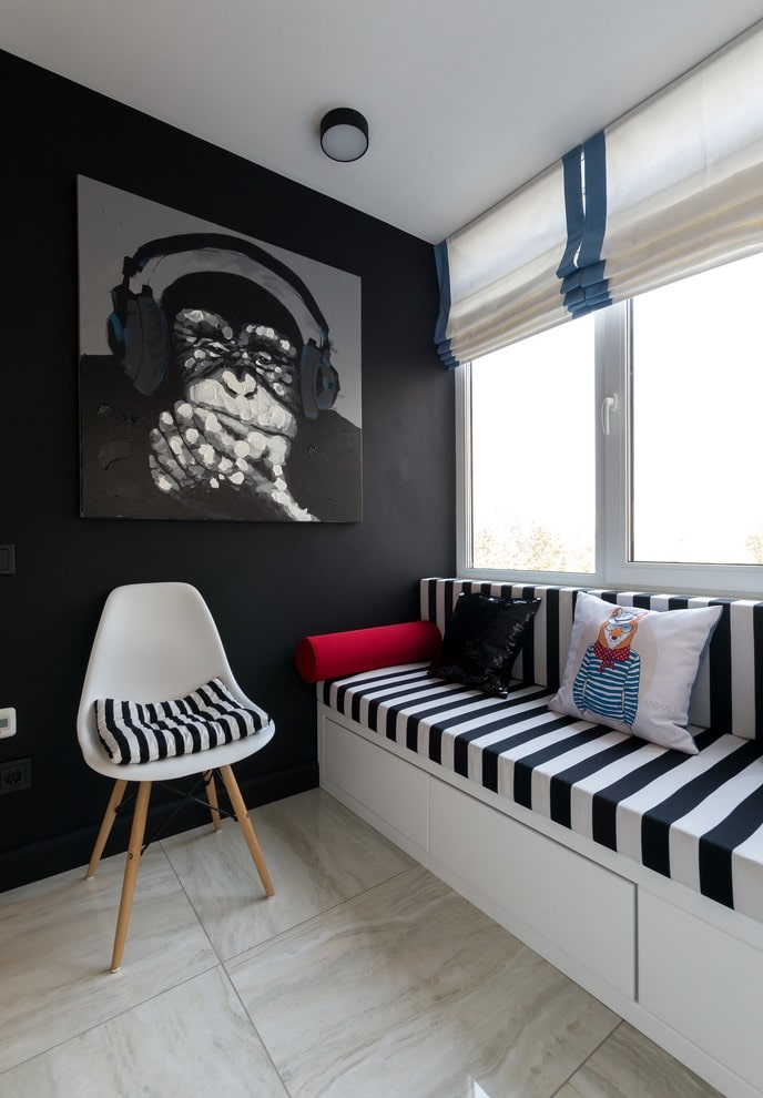 narrow sofa in the interior of the loggia