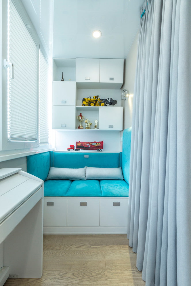 sofa in the interior of a narrow balcony