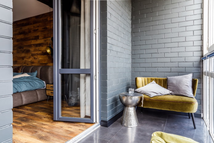 sofa in the interior of the loggia