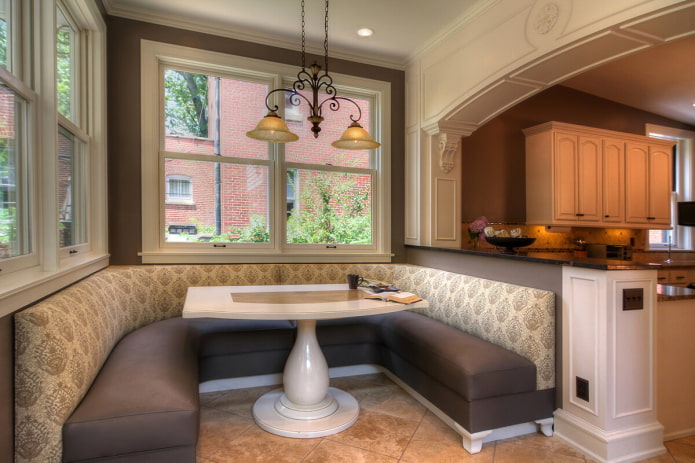 U-shaped sofa in the interior of the kitchen