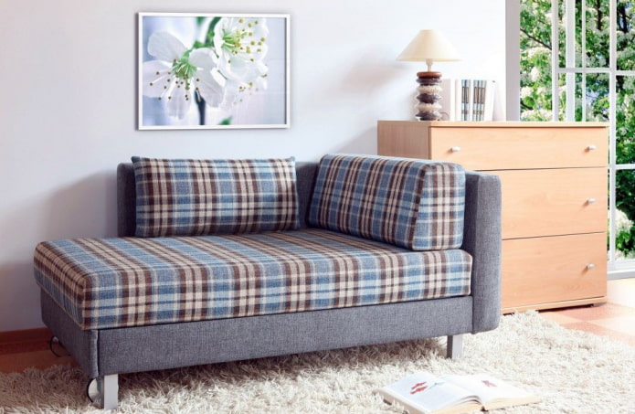 ottoman with upholstery in a cage in the interior