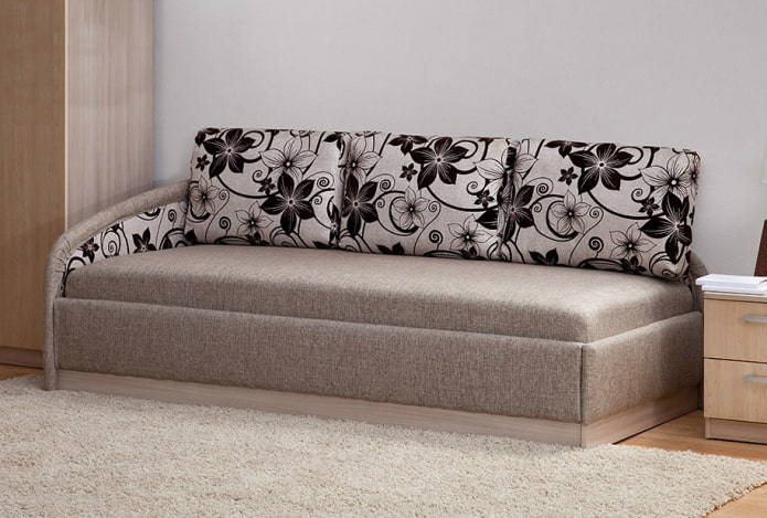 ottoman with pillows in the interior