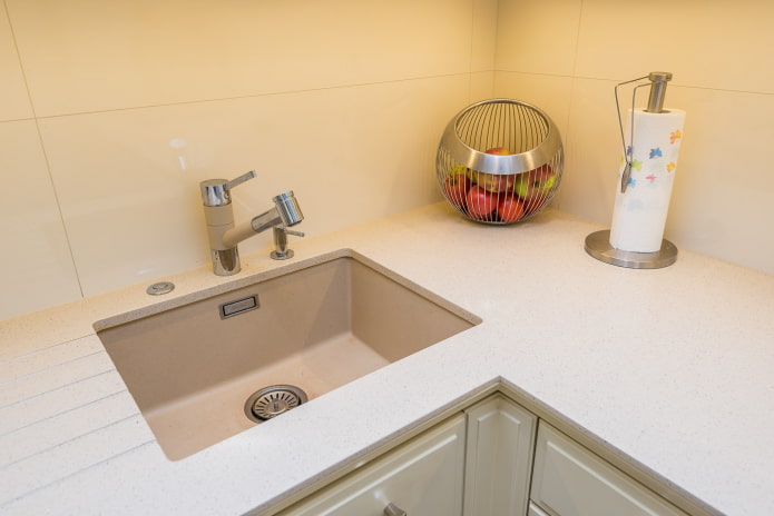 beige sink made of artificial stone in the interior beige sink made of artificial stone in the interior