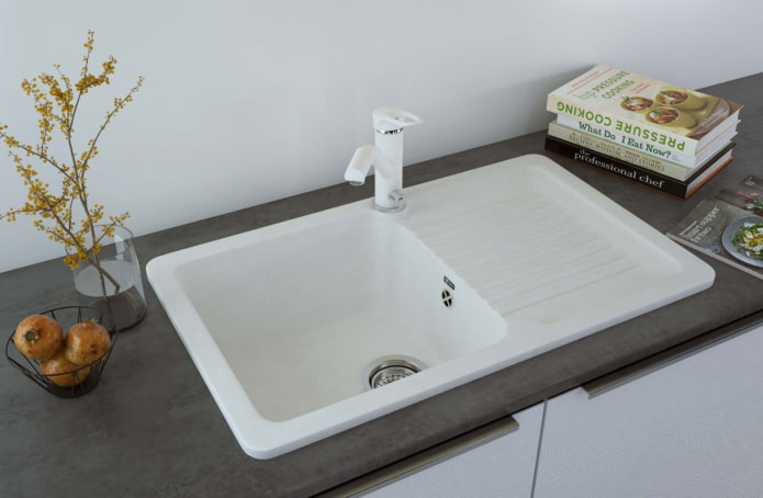 white sink made of artificial stone in the interior white sink made of artificial stone in the interior