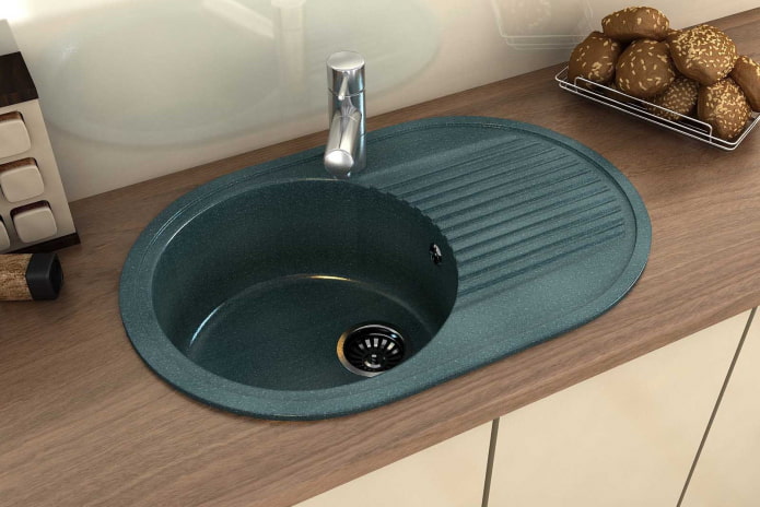 green sink made of artificial stone in the interior green sink made of artificial stone in the interior