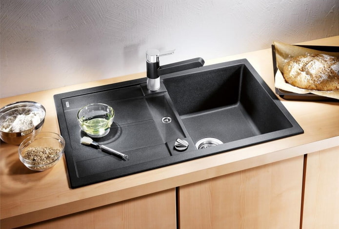 black sink made of artificial stone in the interior black sink made of artificial stone in the interior