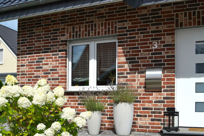 house facade with clinker tiles house facade with clinker tiles