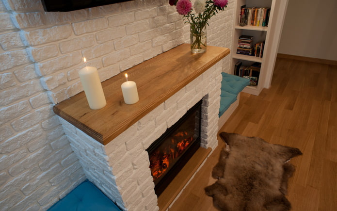 gypsum tiles in the design of the fireplace in the interior gypsum tiles in the design of the fireplace in the interior