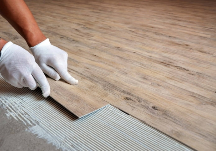 Adhesive quartz vinyl tiles