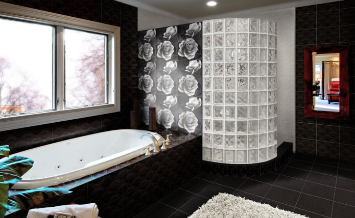 black floor tiles in the bathroom interior
