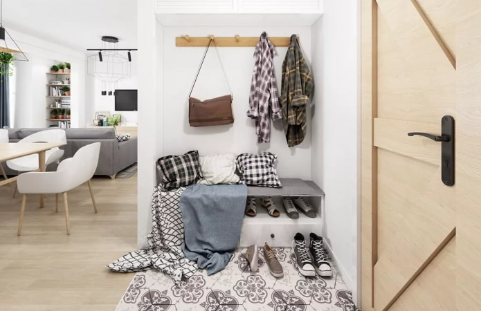 shoe rack with a seat in the interior of the hallway