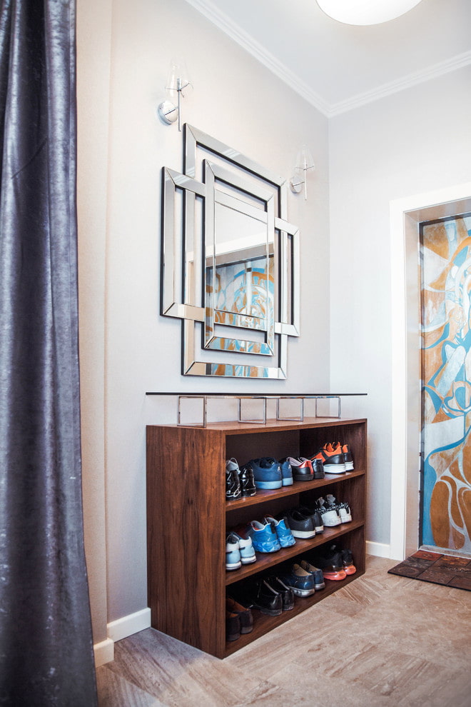 shoe rack made of wood in the interior of the hallway