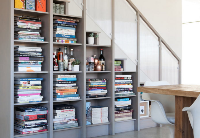 built-in open wardrobe under the flight of stairs