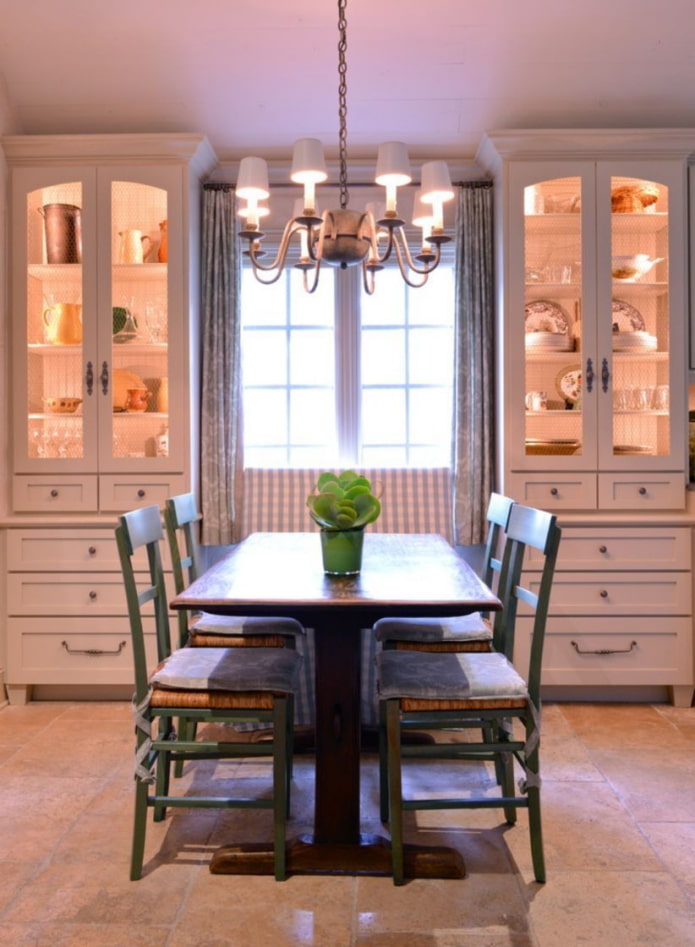 cabinets near the window in the interior of the kitchen cabinets near the window in the interior of the kitchen