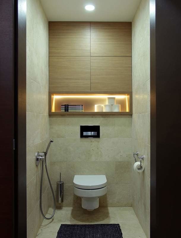 cabinet with lighting in the interior of the toilet