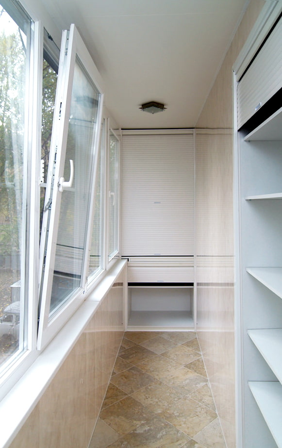 White roller shutters on the balcony