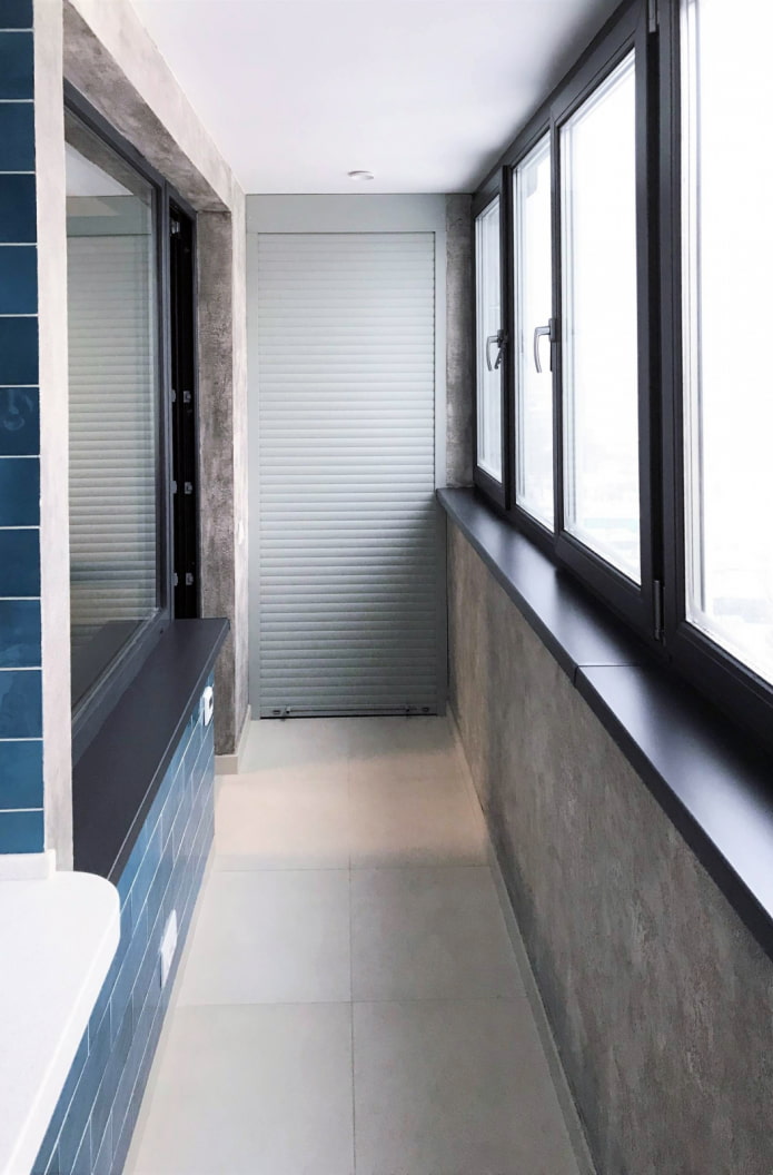 Gray roller shutters on the balcony