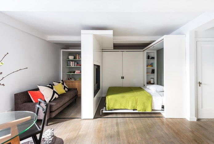 arrangement of furniture in the interior of a studio apartment