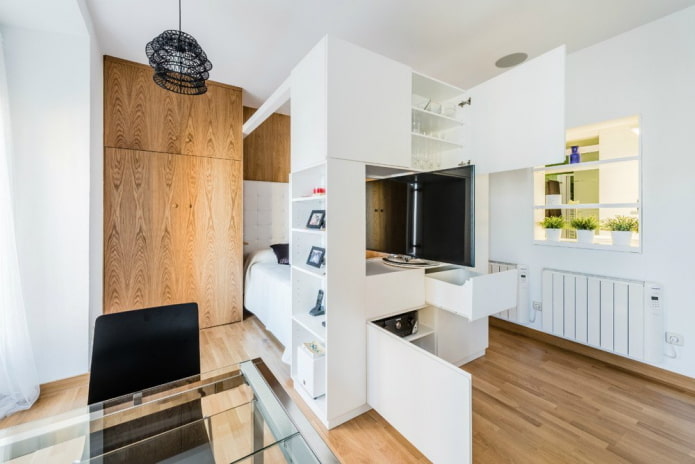 arrangement of furniture in the interior of a studio apartment