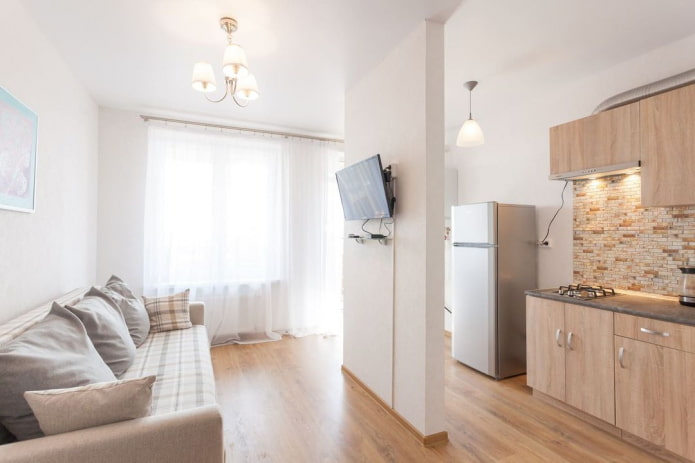 arrangement of furniture in the interior of a studio apartment