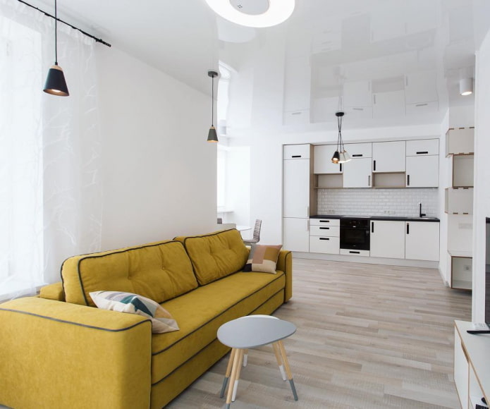 interior with a kitchen area on the far wall interior with a kitchen area on the far wall