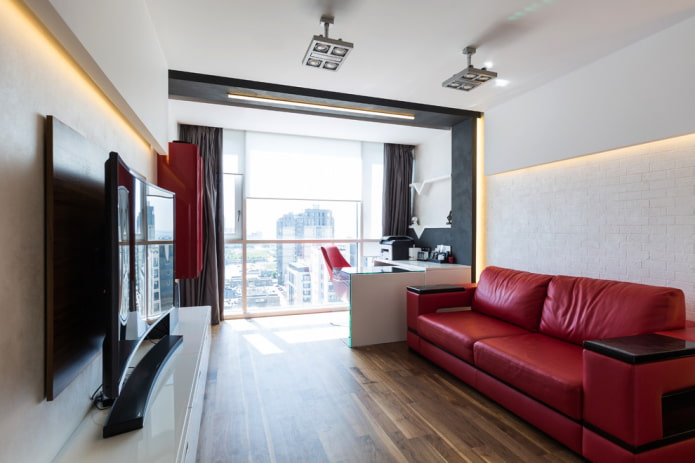 interior of a studio apartment with a balcony