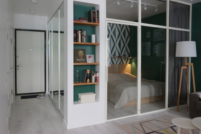 sleeping area in the interior of a studio apartment