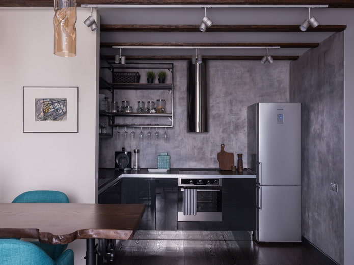 kitchen area in the interior of a studio apartment