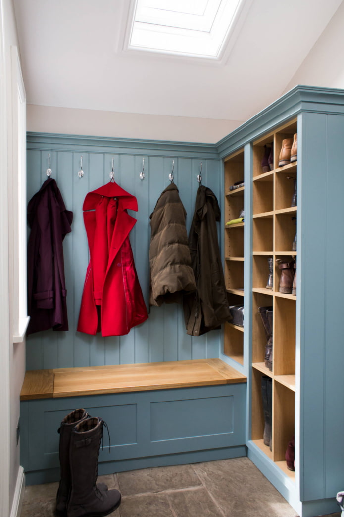 Blue hallway with hangers and seat