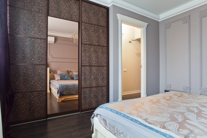 sliding wardrobe with leather facade trim in the bedroom sliding wardrobe with leather facade trim in the bedroom