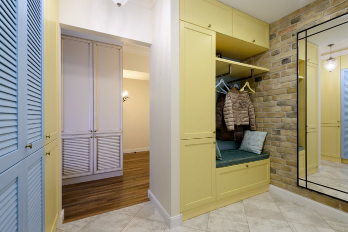yellow wardrobe in the interior of the corridor